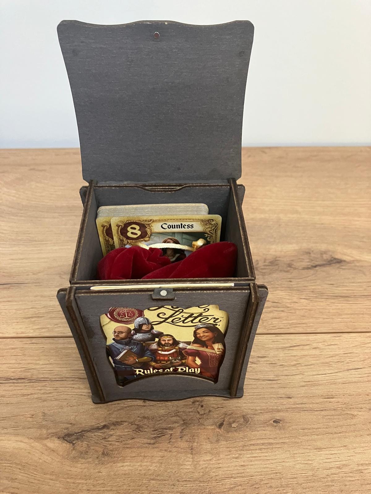 Wooden Framed Deck Box with integrated wooden hinges and magnetic latch