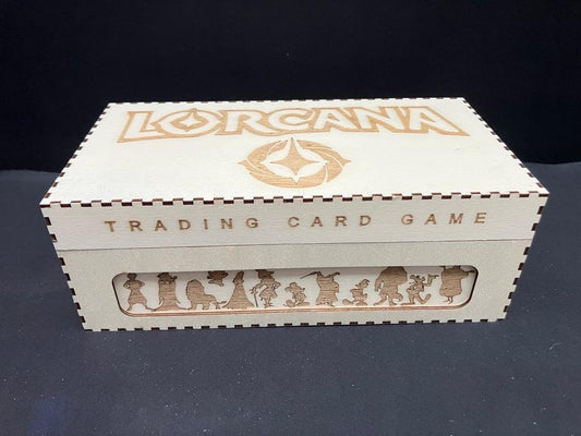 Natural wooden box with Lorcana and Trading Card Game engraved on the lid and front, and a row of character silhouettes