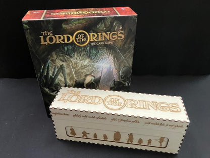 Light wooden single card storage box engraved with the Lord of the Rings logo, beside The Card Game box