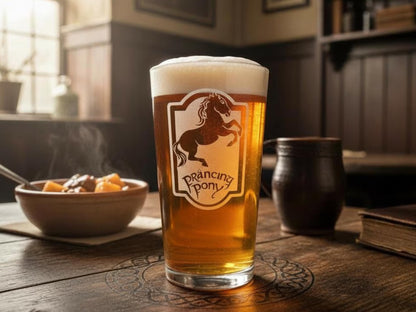 Pint of beer engraved with the Prancing Pony pub sign of a rearing horse, beside a bowl of stew on a tavern table