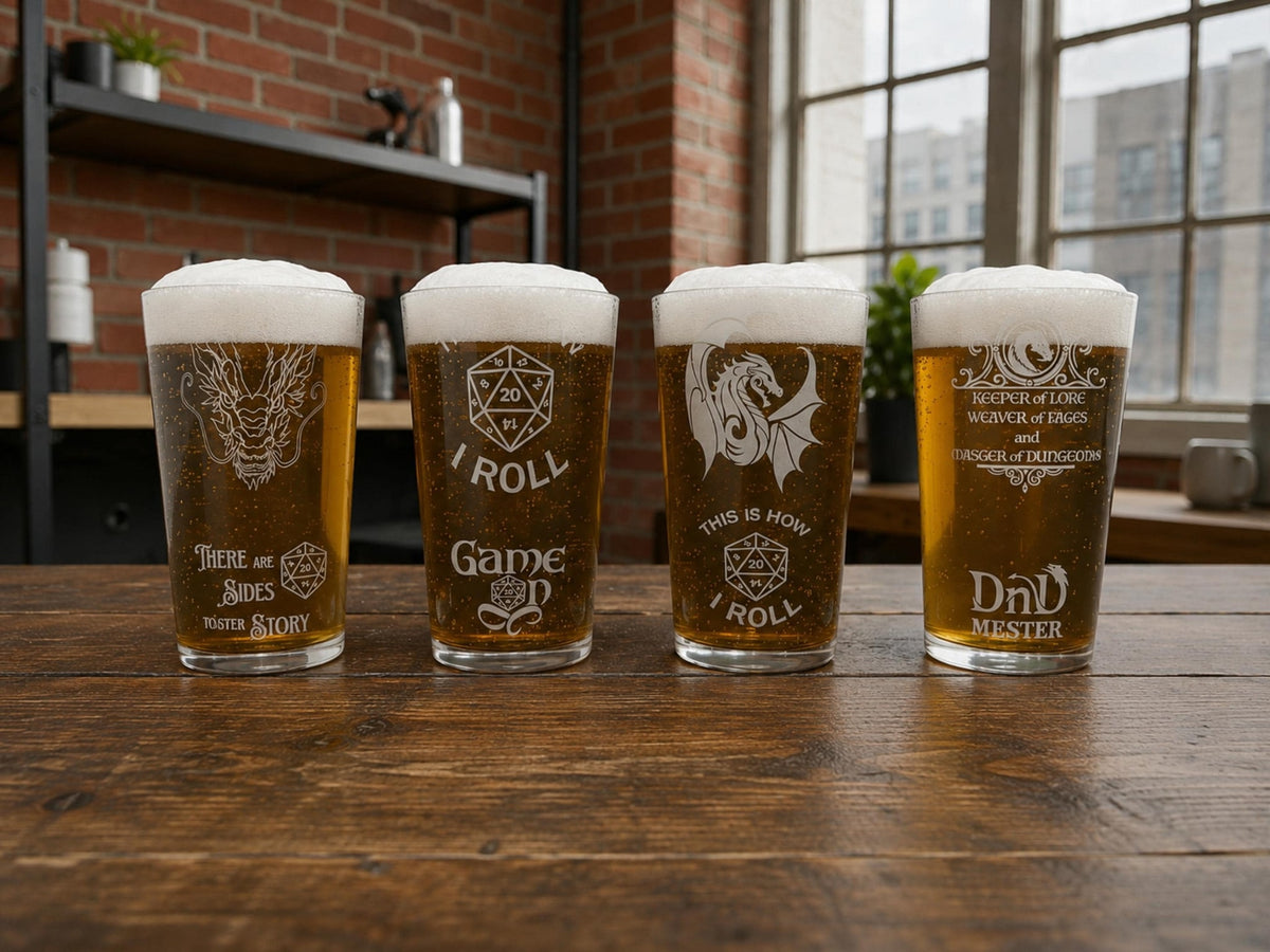 Four pints of beer engraved with DnD designs: a dragon, a d20 with I Roll, Game On and DnD Master, on a wooden bar