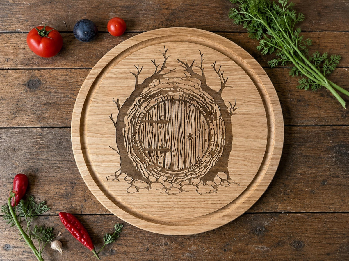 Round wooden chopping board engraved with a round hobbit door between twisting trees, with fresh vegetables