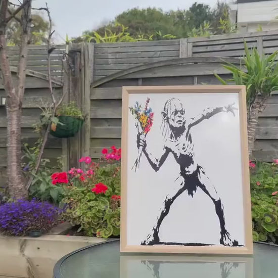 Gollum Throwing Flowers Street Art Framed Print