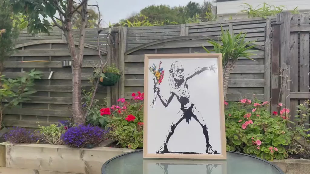 Gollum Throwing Flowers Street Art Framed Print